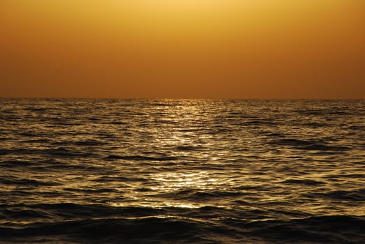 Beautiful sunset and water reflections on Mediterranean sea