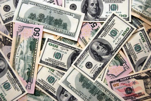 Money background of $100 and $50 bills in USA currency