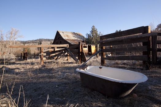 and old wash tub in the middle of a farm