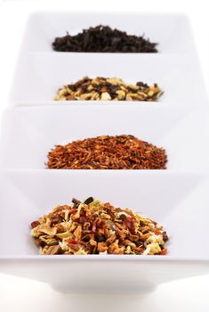 Different kinds of natural tea isolated on white.           