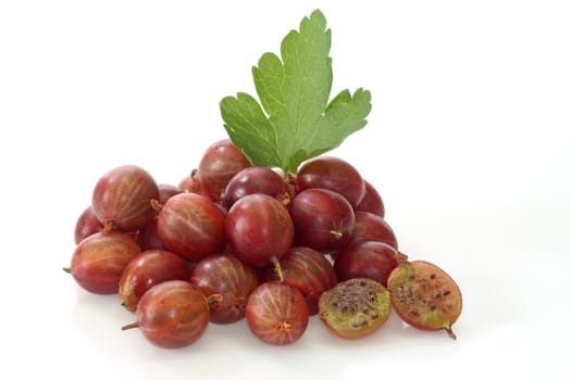 Fresh Berries of gooseberry on a bright background