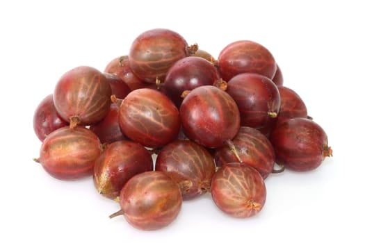 Fresh Berries of gooseberry on a bright background