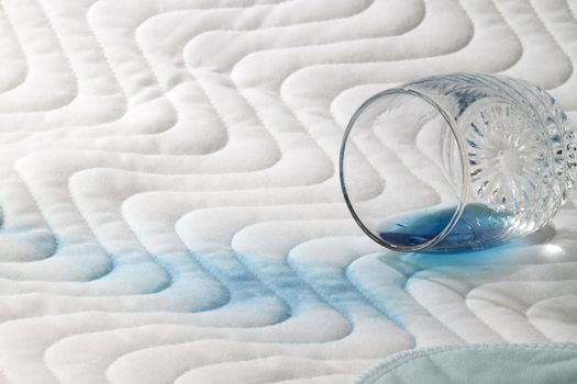 Protection bed layer with a glass and blue fluid