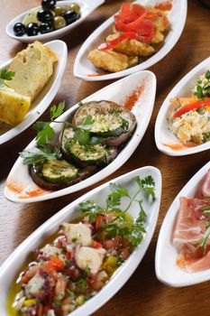 A table full of traditional Spanish tapas.
