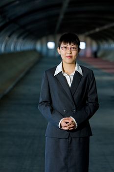 Young asian business woman standing pose with confident