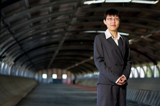 Young asian business woman standing pose with confident