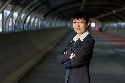 Young asian business woman standing pose with confident