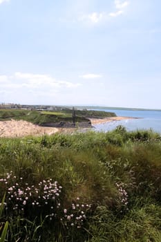 ballybunion beach crowded with people on a hot day