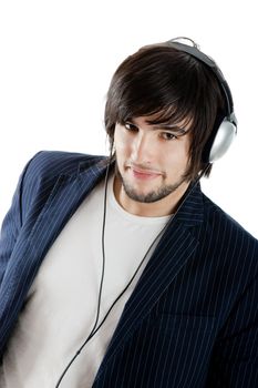 Young Man listening to music with headphones