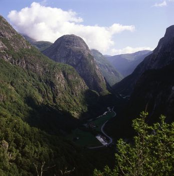 Naeroydal Valley in Norway with mountains and village in valley