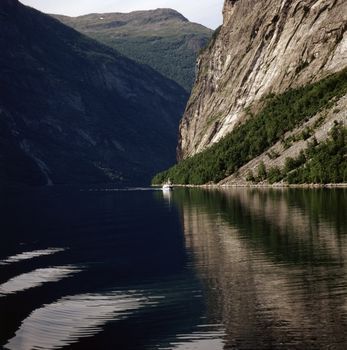 Fjord with a ferry boat