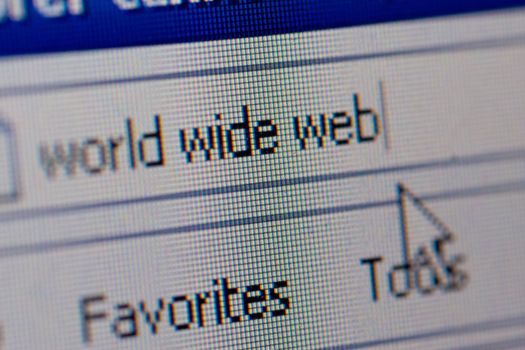 Closeup of internet url address world wide web with an arrow using shallow dof