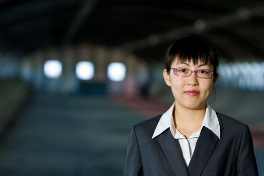 Young asian business woman standing pose with confident