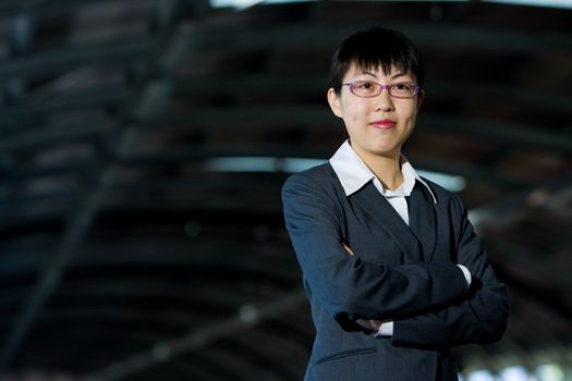 Young asian business woman standing pose with confident