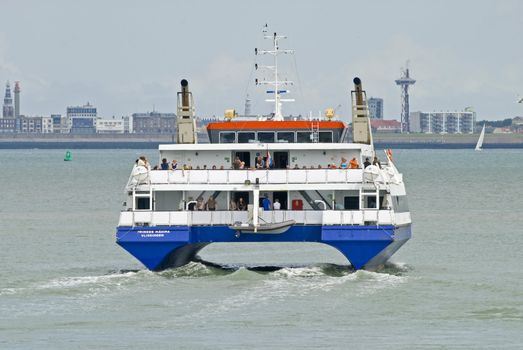 Ferry boat leaving the harbor from Beskens, the Netherlands

