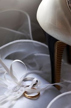 Wedding rings on a satiny fabric