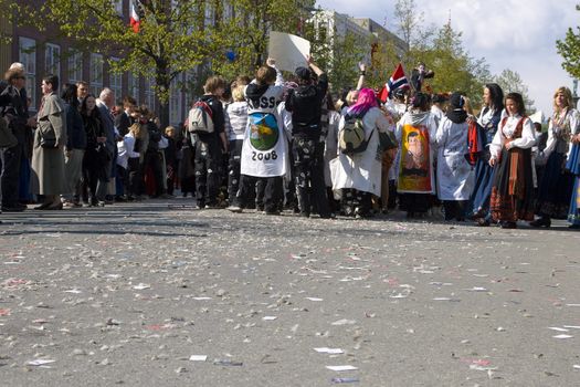 The parade is popular amongst the Russ - students in their last year of upper secondary school that celebrate the end of 13 years of school. At the end of the parade, their business cards and party effects is all thats left in the streets. 