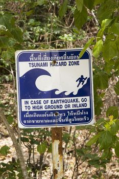 Tsunami warning sign on a beach off Krabi, Thailand. 