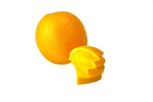 An orange, and a sliced orange