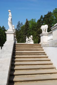 Stairs with classical marble statues in terraced garden. Arkhangelskoe estate, Moscow, Russia