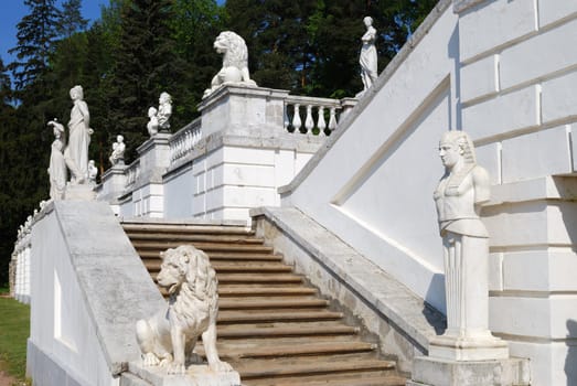 Stairs with classical marble statues in terraced garden. Arkhangelskoe estate, Moscow, Russia. Horizontal version