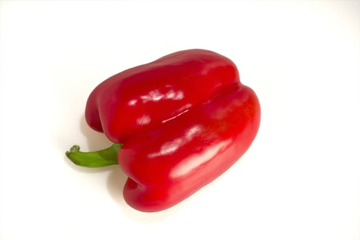 A red pepper on a table