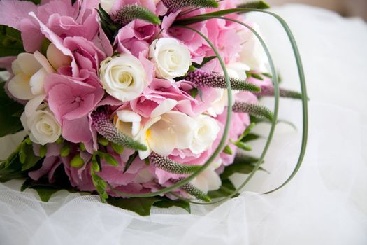Beautiful wedding bouquet made up with pink hydrangea and white roses