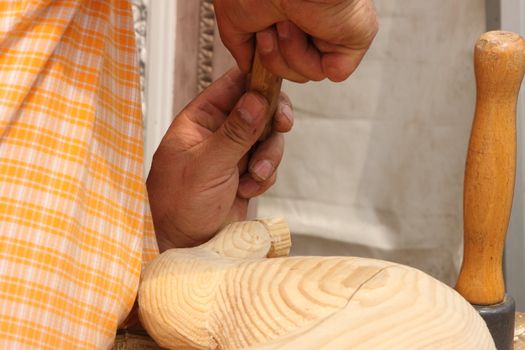 wood carving sculpture of a wooden horse  