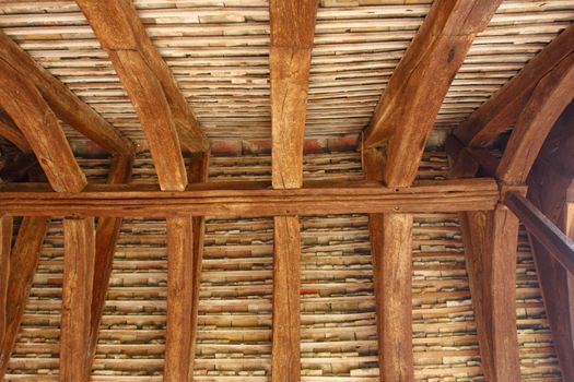 structural wood roof of the entrance of an old church