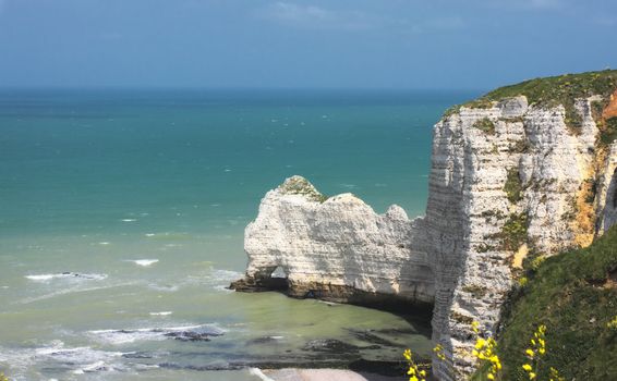 Beach with cliff Falaise d'Aval. Normandy, Cote d'Albatre, France. 