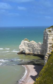 Beach with cliff Falaise d'Aval. Normandy, Cote d'Albatre, France. 