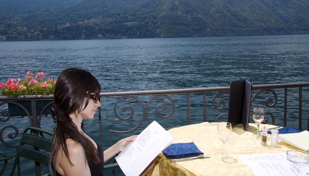 Looking at the menu at an outside restaurant in Como Italy