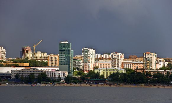 Sky with storm clouds over the port city. Samara, Russia. City Quay and beaches.