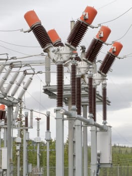 High-voltage circuit breaker in electric substation serving the power grid.