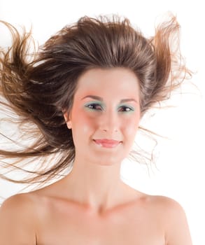 Shot of young beautiful brunette woman in studio