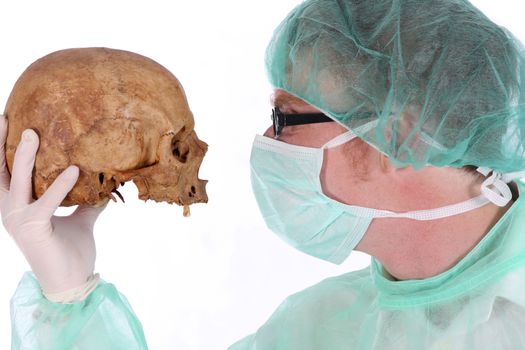 Details surgeon with skull on white background