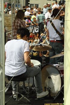 Backstage view of a band entertaining some of the estimated 250,000 people who attended the annual Bristol Harbour Festival over 3 days in 2009