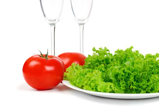 Leaves lettuce and tomato on white background