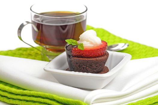 Delicious chocolate and fresh fruit dessert with coffee.