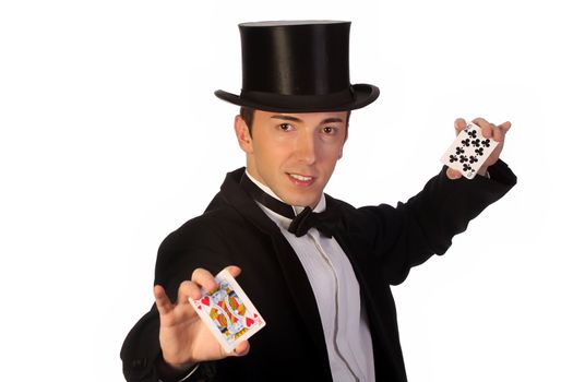 young magician performing with cards on white background