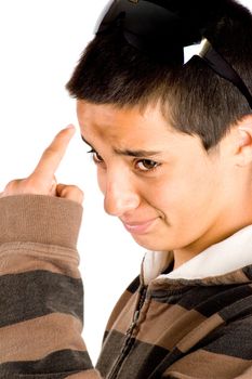 pakistani teenage boy is pointing to his forhead on white