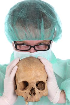 Details surgeon with skull on white background