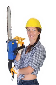 Beauty woman with chainsaw on white background