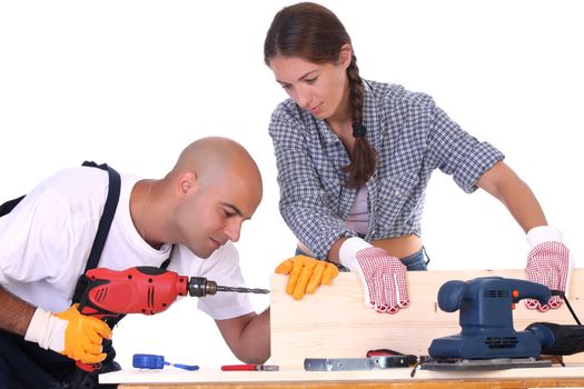 construction workers at work on white background