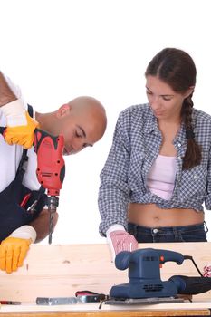 construction workers at work on white background