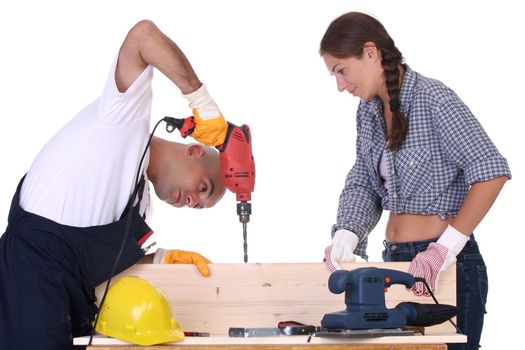 construction workers at work on white background