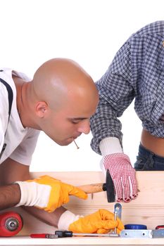 construction workers at work on white background 