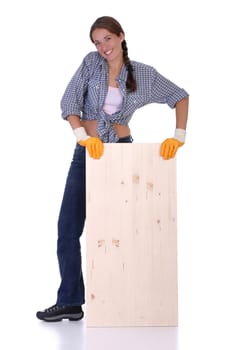 woman carpenter holding wooden plank on white background 