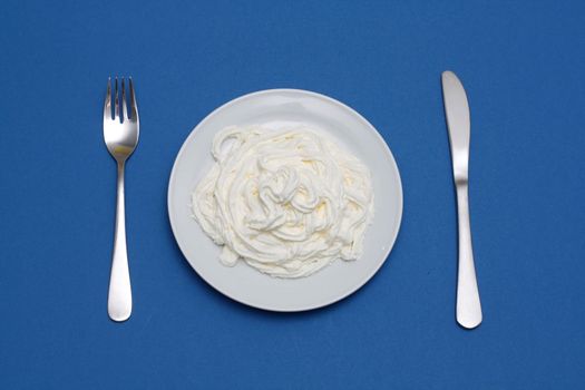 Whipped cream on a plate
