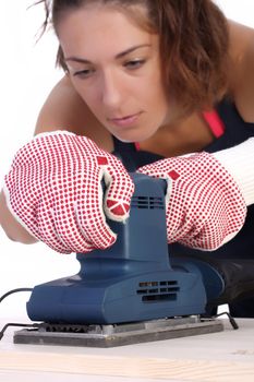 woman carpenter at work on white background 